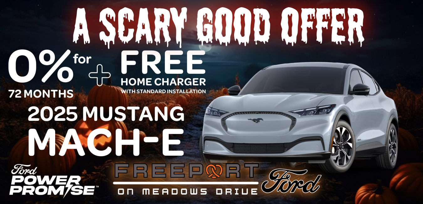 2025 Ford Mustang Mach-E parked under fall leaves in Freeport, Illinois during sunset with pumpkins nearby